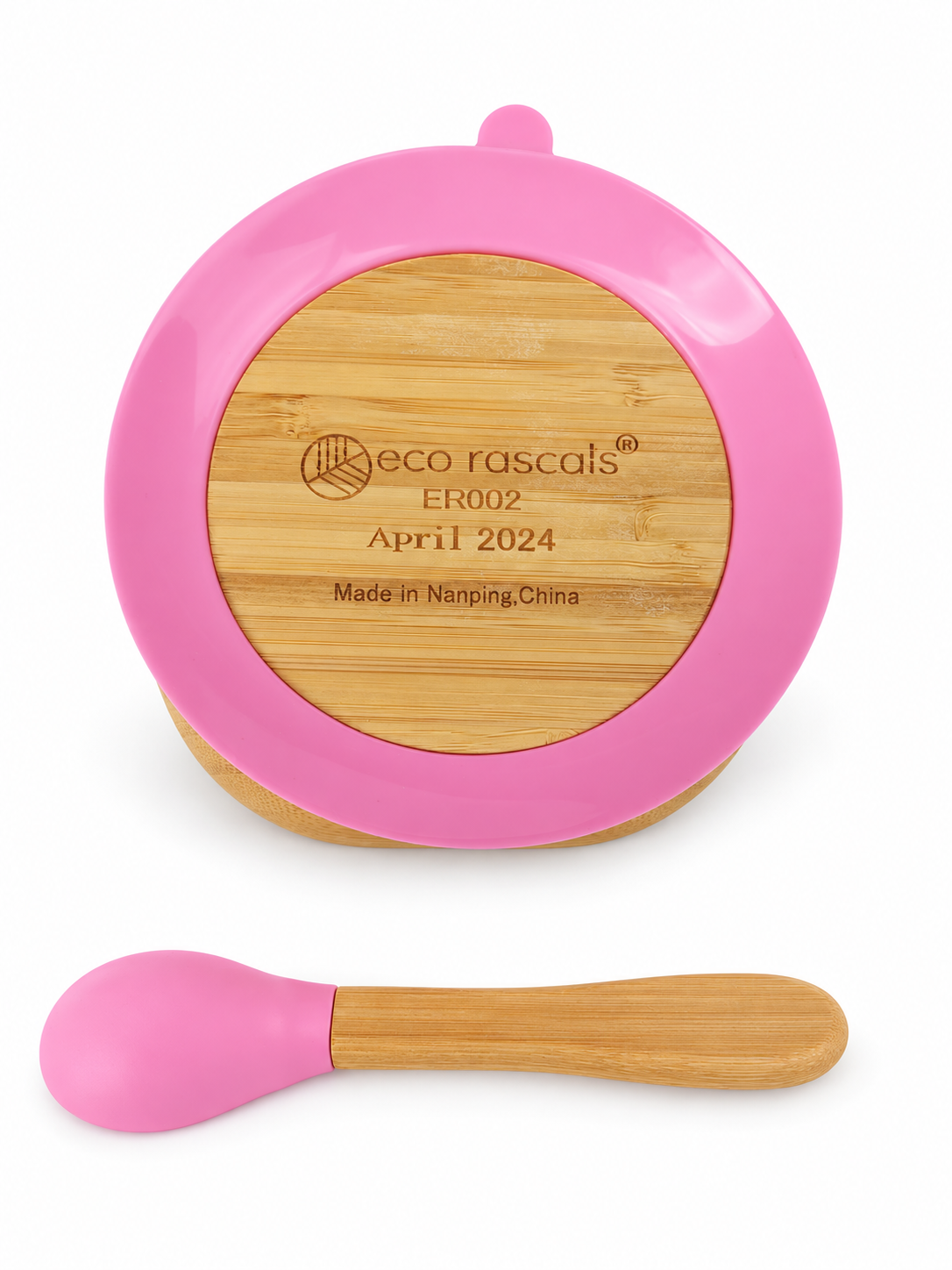 Parte inferior del bol Eco Rascals rosa con ventosa de silicona y cuchara, fondo blanco