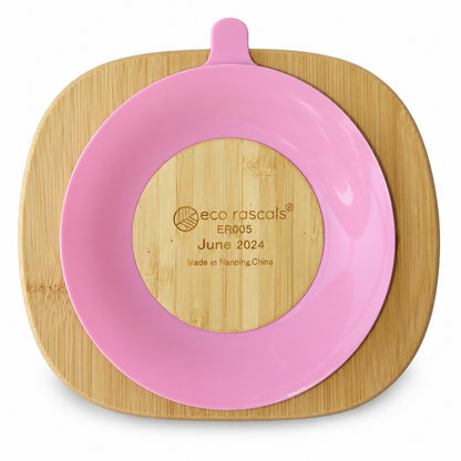 Parte inferior del plato rectangular Eco Rascals con ventosa rosa sobre fondo blanco